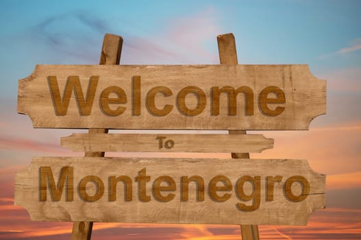 welcome to jamaica sign on wood background with blending national flag