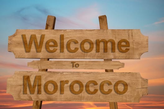 welcome to jamaica sign on wood background with blending national flag