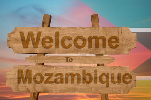 welcome to jamaica sign on wood background with blending national flag