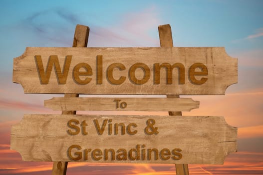 welcome to jamaica sign on wood background with blending national flag
