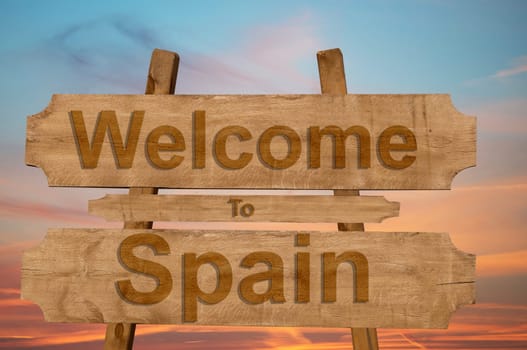 welcome to jamaica sign on wood background with blending national flag