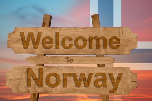 welcome to jamaica sign on wood background with blending national flag