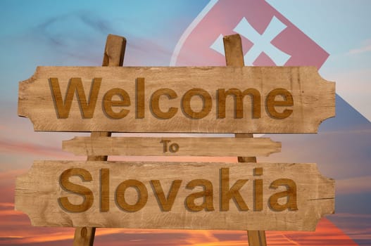 welcome to jamaica sign on wood background with blending national flag