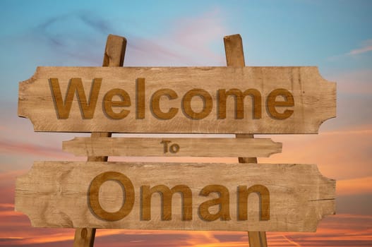 welcome to jamaica sign on wood background with blending national flag