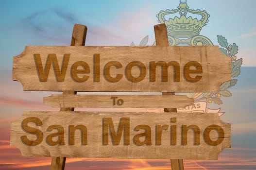 welcome to jamaica sign on wood background with blending national flag