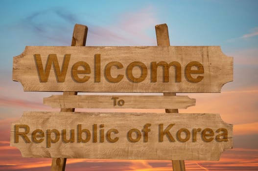 welcome to jamaica sign on wood background with blending national flag