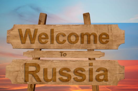 welcome to jamaica sign on wood background with blending national flag