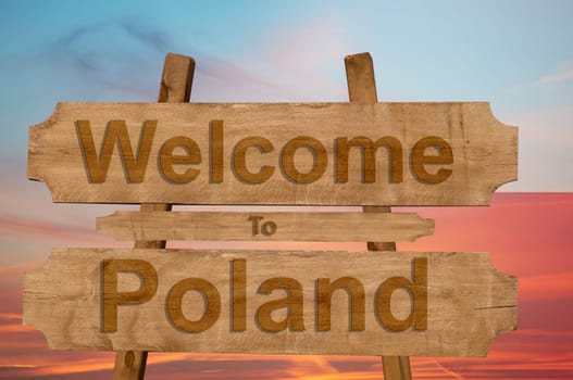 welcome to jamaica sign on wood background with blending national flag