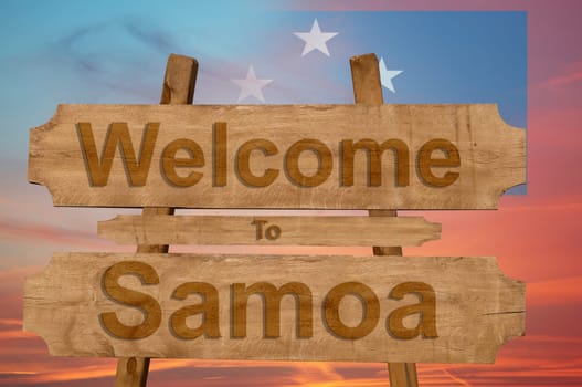 welcome to jamaica sign on wood background with blending national flag