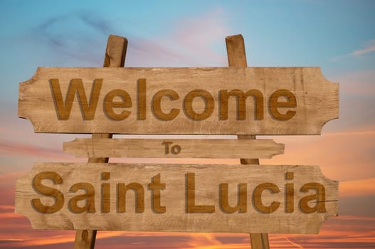 welcome to jamaica sign on wood background with blending national flag