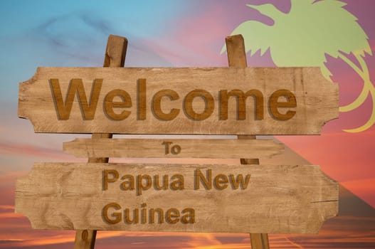 welcome to jamaica sign on wood background with blending national flag