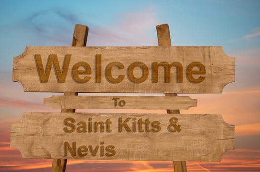 welcome to jamaica sign on wood background with blending national flag