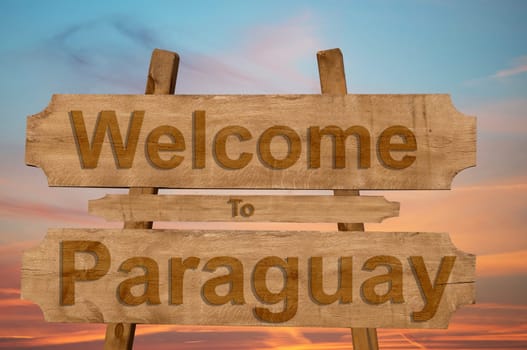 welcome to jamaica sign on wood background with blending national flag