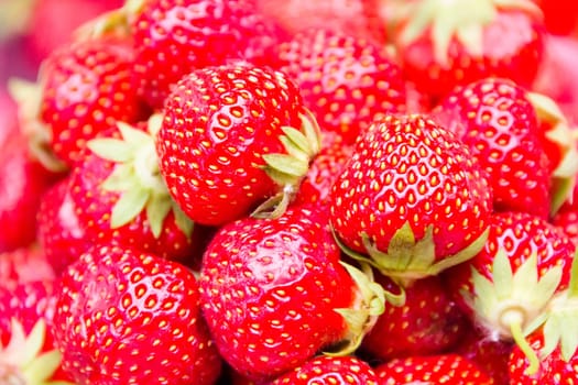 Photo of the background fresh red strawberries