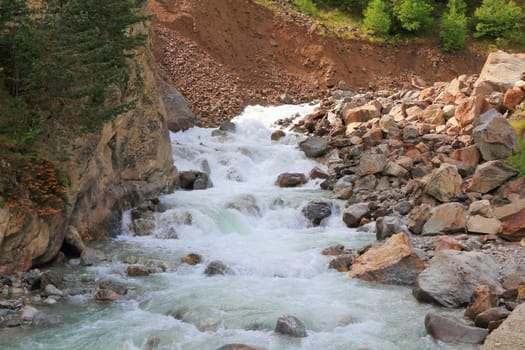 Image of waterfall in Caucasus mountains in summer