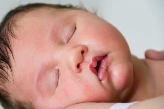 Image of sleeping beautiful cute newborn girl