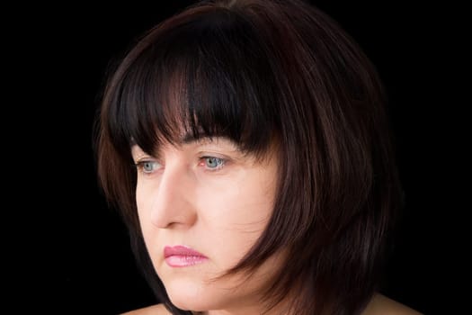 Portrait of beautiful brunette with blue eyes