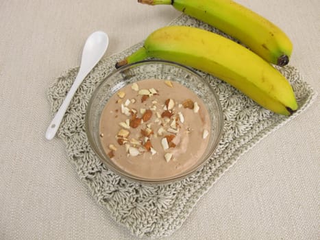 Homemade chocolate ice cream with frozen bananas,cocoa and almonds