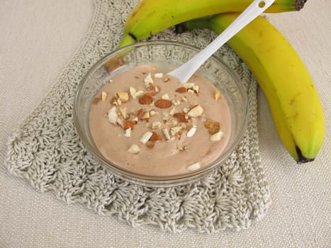Homemade chocolate ice cream with frozen bananas,cocoa and almonds