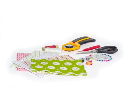 Composition of instruments, items and fabrics for patchwork