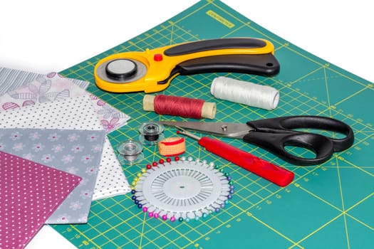 Composition of quilting instruments, items and fabrcs