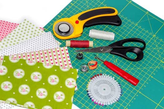 Hobby composition of quilting instruments, items and fabrics