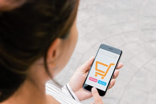 close up woman use phone shopping online on thrid person view
