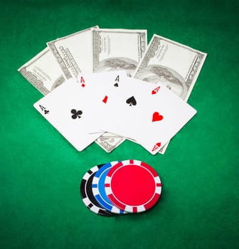 Poker cloth, a deck of cards and chips. Background.