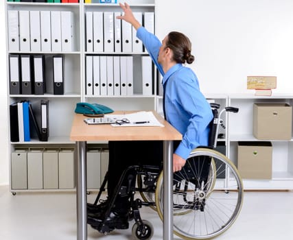 disabled business man in wheelchair need help