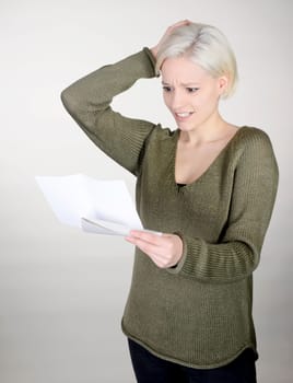 Woman reads bad news