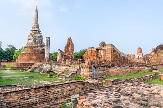 Ancient ruins of pagoda at Wat Phra Mahathat temple is a famous attractions in Phra Nakhon Si Ayutthaya Historical Park, Thailand