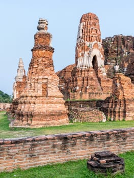 Ancient ruins of pagoda at Wat Phra Mahathat temple is a famous attractions in Phra Nakhon Si Ayutthaya Historical Park, Thailand