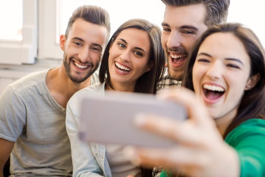 Friends faving fun and making a selfie