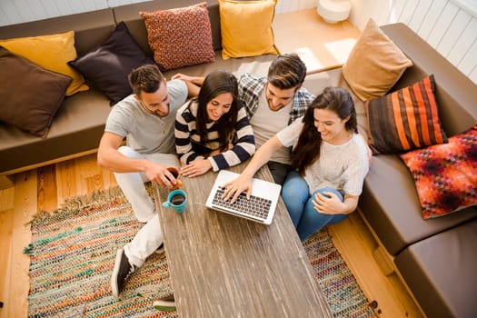 Group of friends study at the local coffee shop