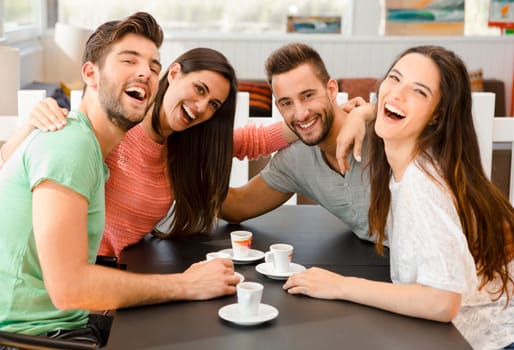 Friends having a great day at the local coffee shop