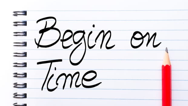 Begin On Time written on notebook page with red pencil on the right