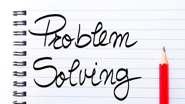 Problem Solving written on notebook page with red pencil on the right