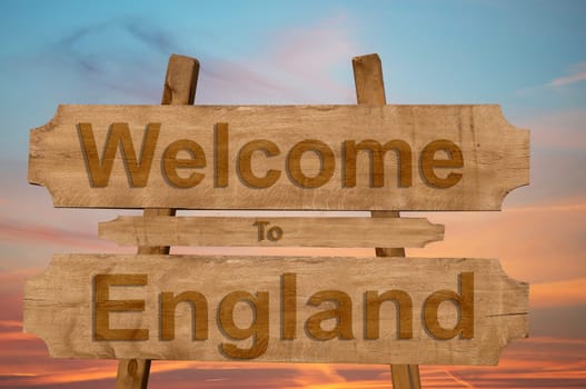 welcome to ecuador sing on wood background with blending national flag