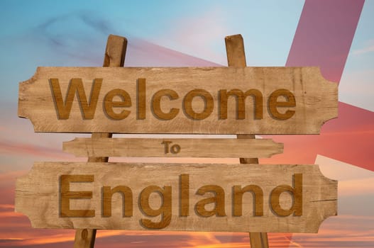 welcome to ecuador sing on wood background with blending national flag