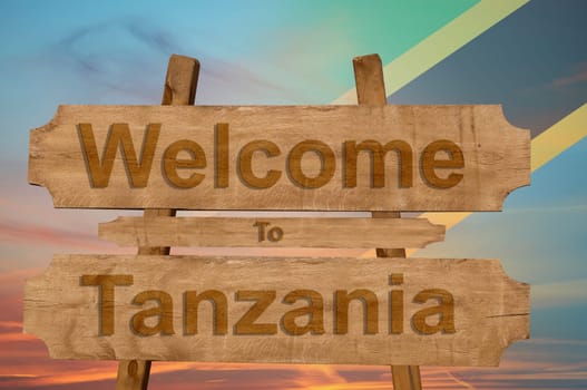 welcome to ecuador sing on wood background with blending national flag