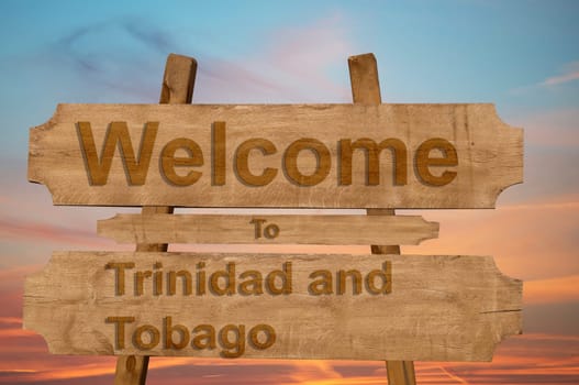 welcome to ecuador sing on wood background with blending national flag