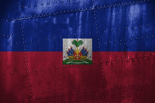 metal texutre or background with haiti flag