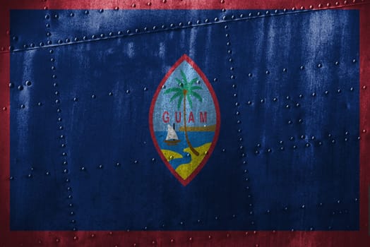 metal texutre or background with guam flag