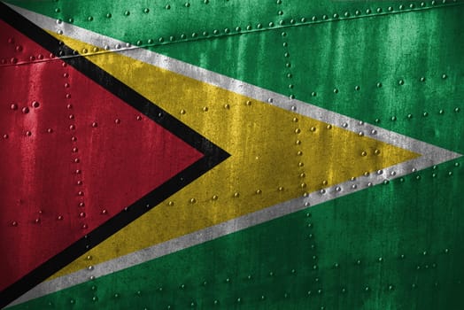 metal texutre or background with guyana flag