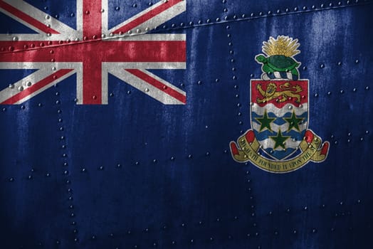 metal texutre or background with cayman islands flag