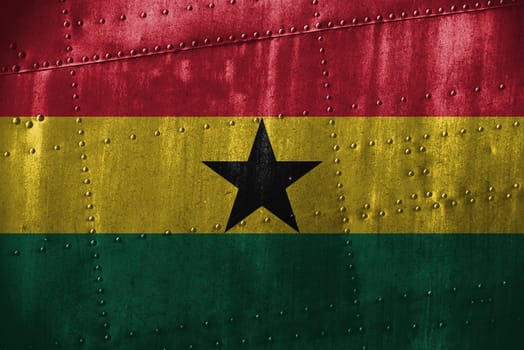 metal texutre or background with ghana flag
