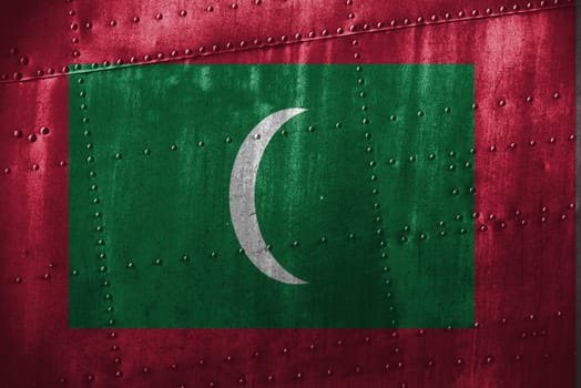 metal texutre or background with maldives flag