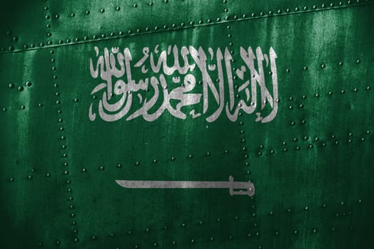 metal texutre or background with saudi arabia flag