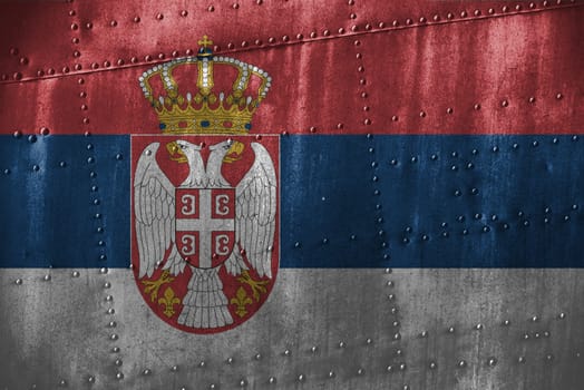 metal texutre or background with serbia flag
