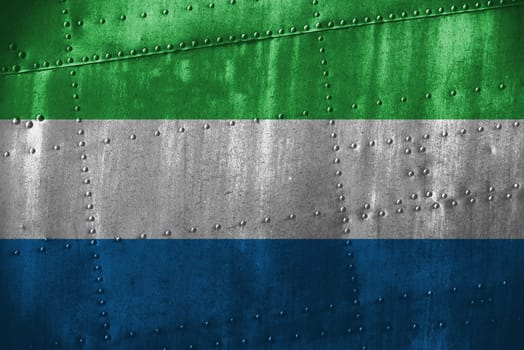 metal texutre or background with sierra leone flag